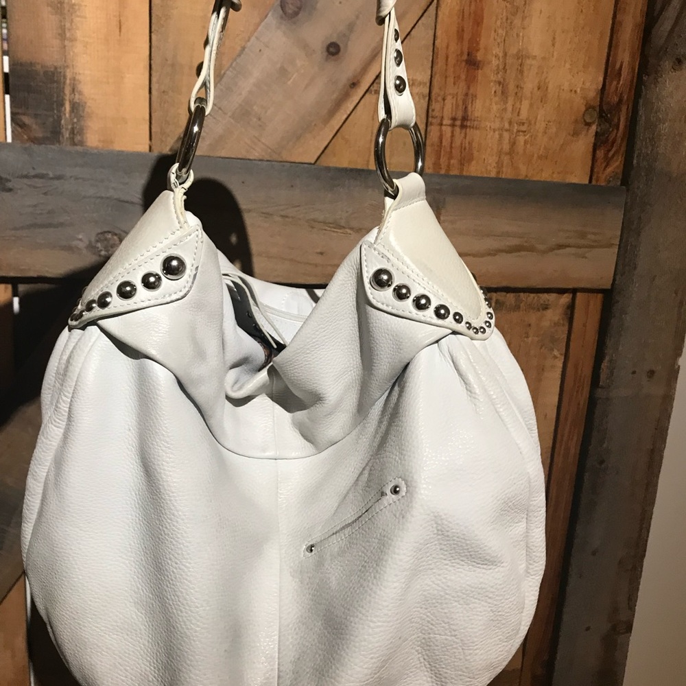 While leather handbag